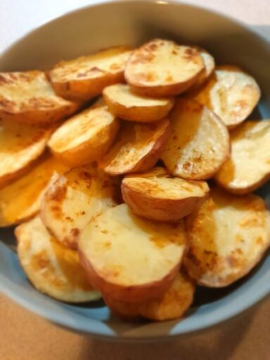halved-baked-potatoes-in-dish