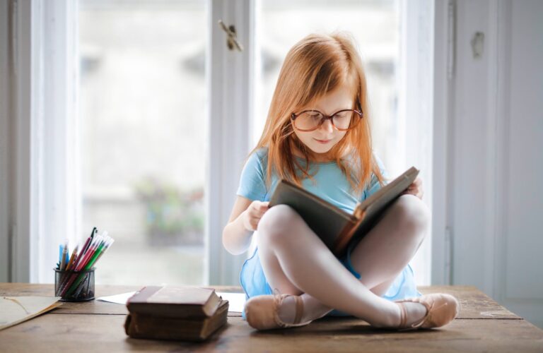 photo of girl reading book