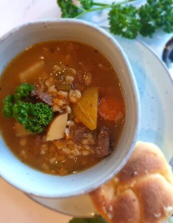 beef, barley and vegetable soup and bread roll